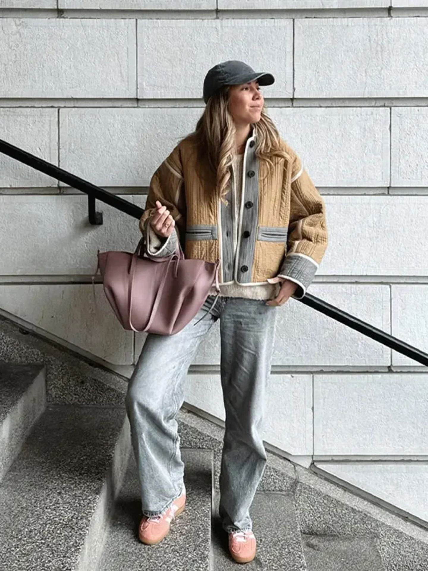 Tan corduroy jacket with light jeans, baseball cap, and mauve handbag from Clar Mevsimlik