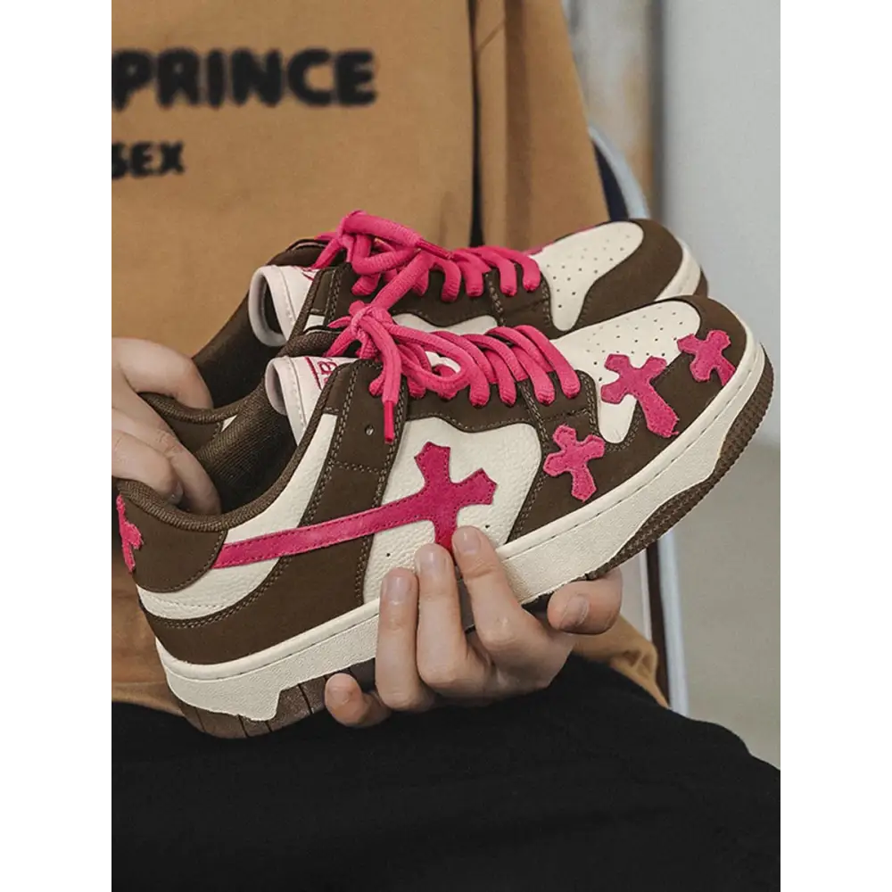 Bellarno kido sneakers in brown, white, and pink with cross designs and pink laces